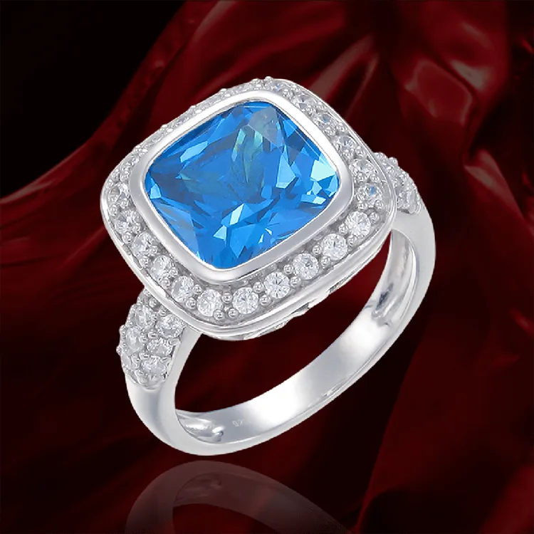 Sparkling Blue Cushion Cut Ring with Halo