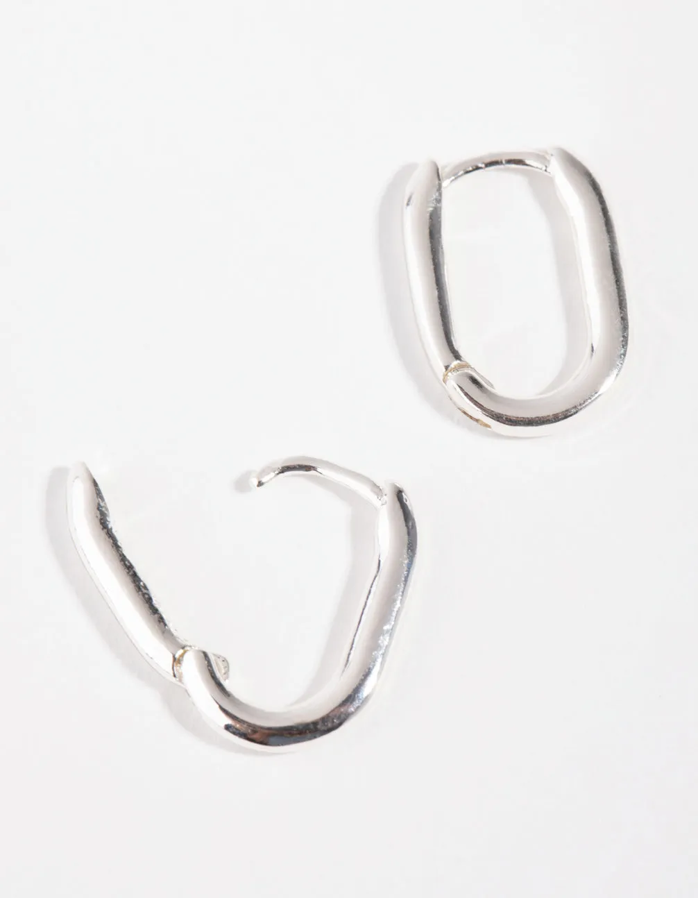 Sterling Silver Sleek Oval Huggie Earrings